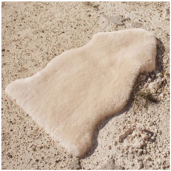Tapis de jeu en peau de mouton Wrigglemat - Milk