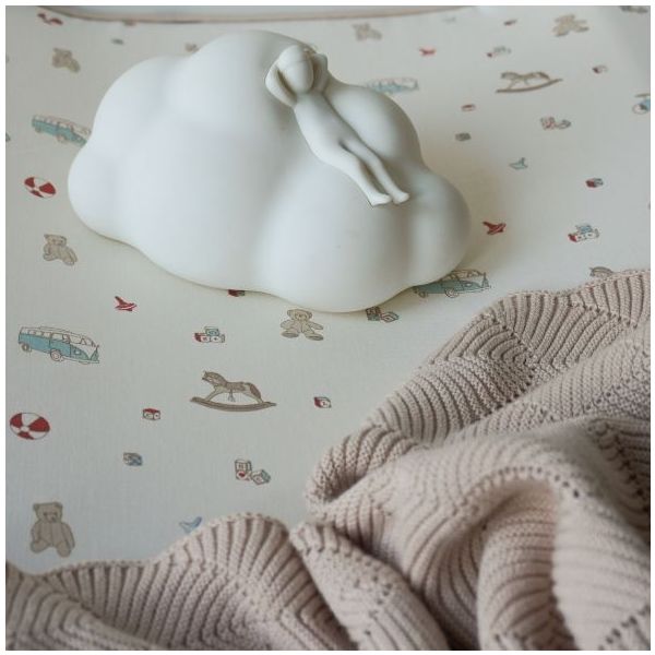 Couverture bébé en tricot festonnée - Amande